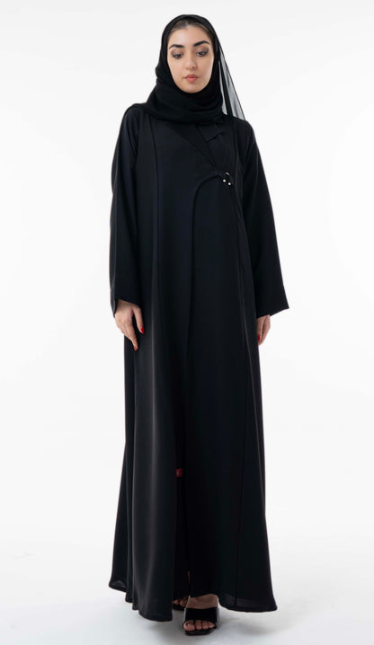 Black Abaya With Notched Collar And An Elegant Metallic Buckle