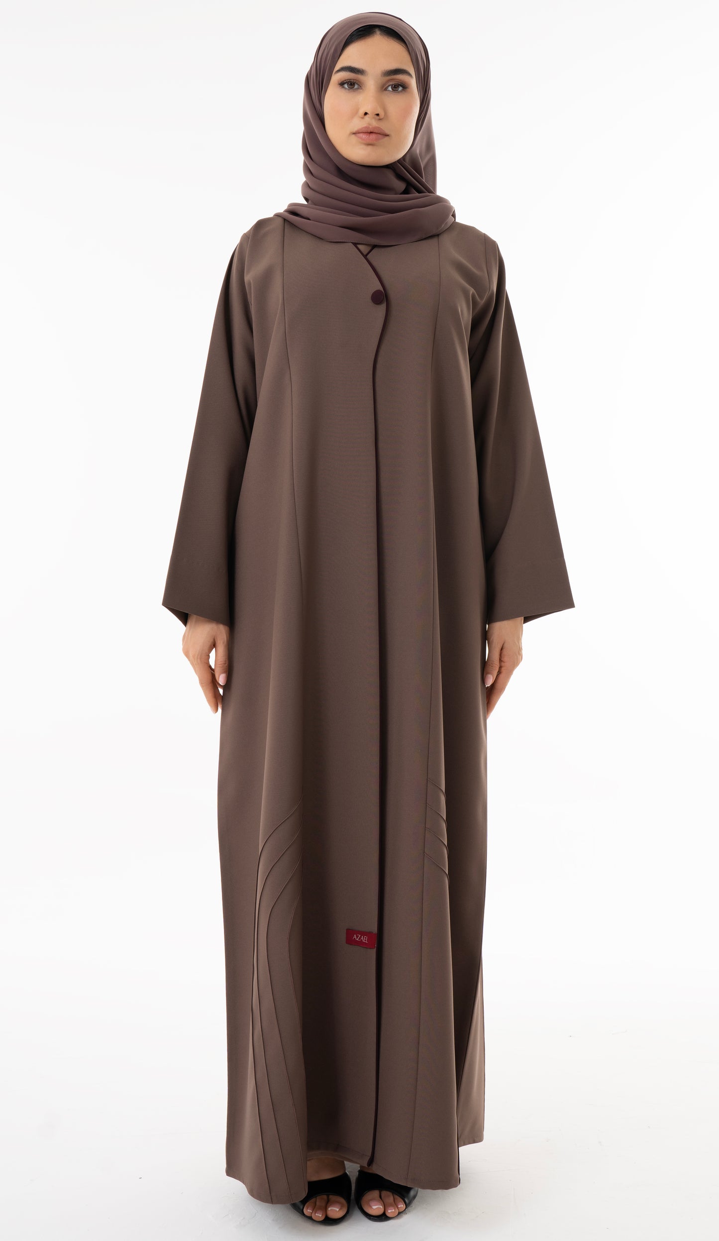 Abaya With Delicate Pin-tucked Detailing In The Front And Back With Contrast Piping In The Front.