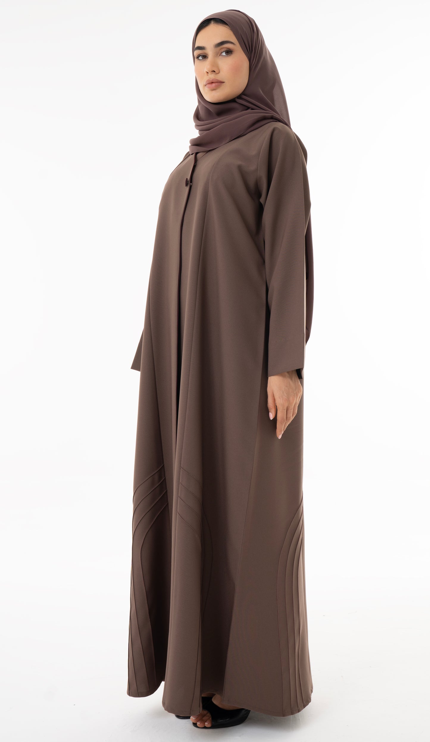 Abaya With Delicate Pin-tucked Detailing In The Front And Back With Contrast Piping In The Front.