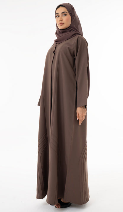 Abaya With Delicate Pin-tucked Detailing In The Front And Back With Contrast Piping In The Front.