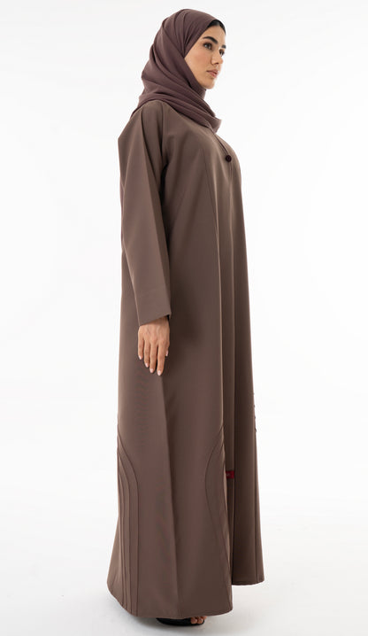 Abaya With Delicate Pin-tucked Detailing In The Front And Back With Contrast Piping In The Front.