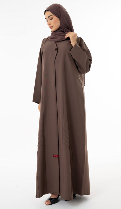 Abaya With Delicate Pin-tucked Detailing In The Front And Back With Contrast Piping In The Front.