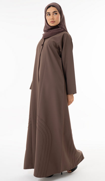 Abaya With Delicate Pin-tucked Detailing In The Front And Back With Contrast Piping In The Front.