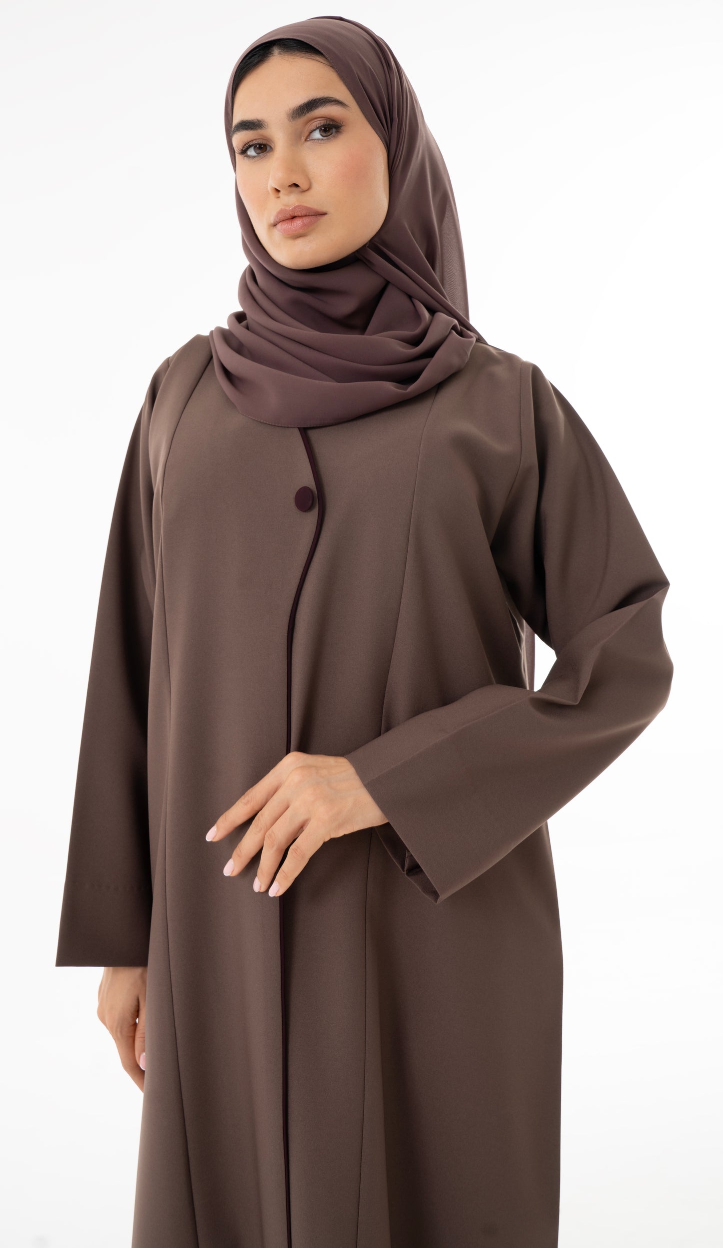 Abaya With Delicate Pin-tucked Detailing In The Front And Back With Contrast Piping In The Front.